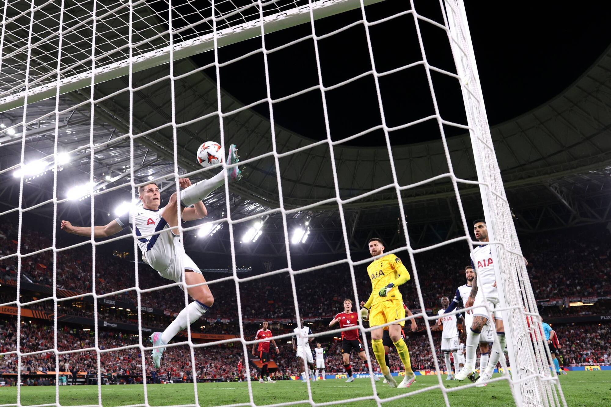 PICTORIAL: Tottenham Europa League Win vs Man United Ends 17-Year Trophy Drought Daily Report Nigeria Micky van de Ven makes an acrobatic block to deny Rasmus Hojlund’s close-range header.