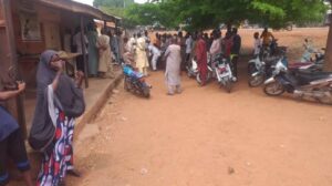 PHOTOS: Parents Throng School Where 200 Children Were kidnapped in Niger | Daily Report Nigeria