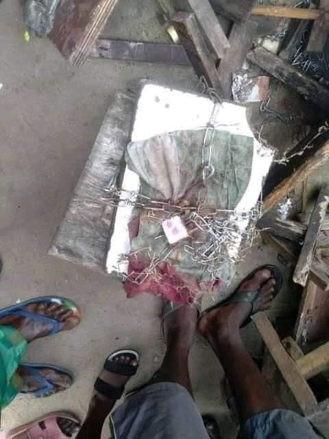 Photos of Men and Women "in chains" Discovered in a Shrine after Native Doctor was Allegedly Caught Burying a Three-month-old baby Alive | Daily Report Nigeria