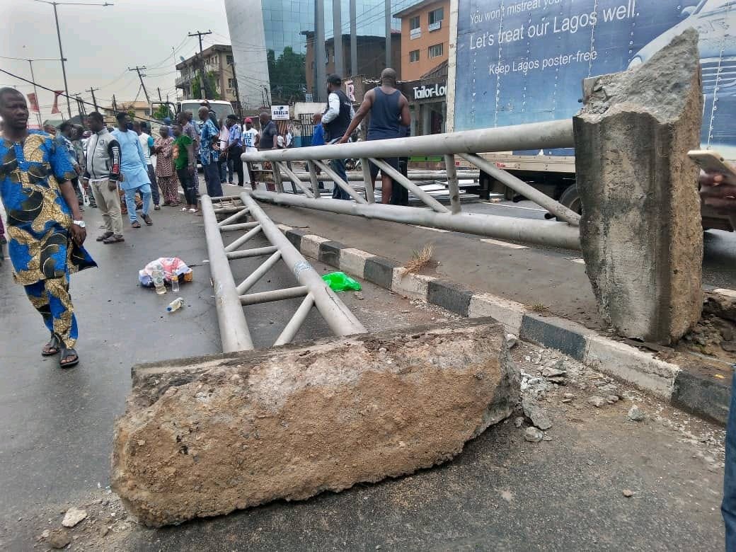 Huge Billboard Falls on Tricycle in Lagos | Daily Report Nigeria