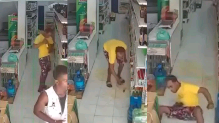 CCTV Captures Thief Trying to Sneak Out of Store with Wine Bottle | Daily Report Nigeria