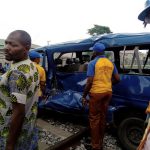 PHOTOS: 2 Injured As Bus Rams Into Moving Train | Daily Report Nigeria