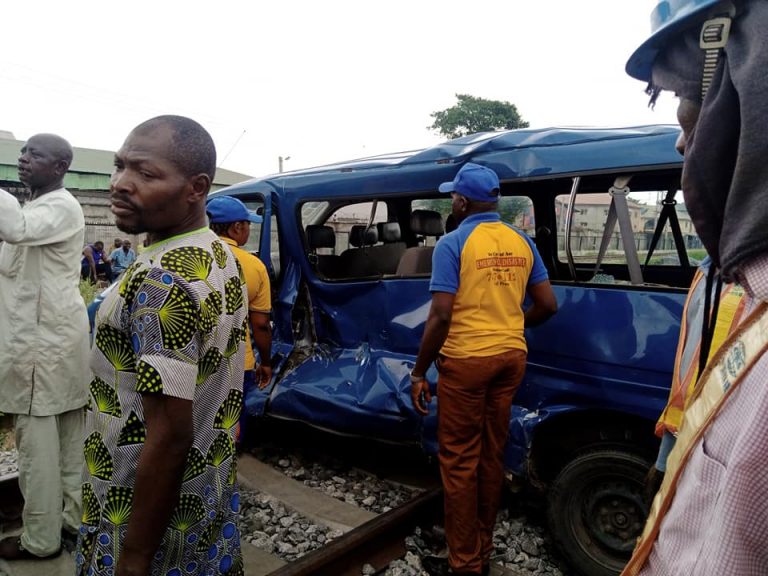 PHOTOS: 2 Injured As Bus Rams Into Moving Train | Daily Report Nigeria