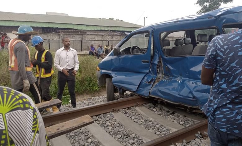 PHOTOS: 2 Injured As Bus Rams Into Moving Train | Daily Report Nigeria