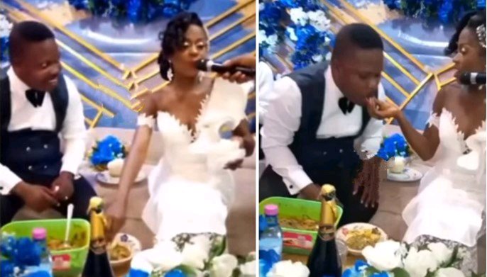 Moments Bride Feeds Hubby Fufu At Wedding bride feeds groom fufu2620507887209830283