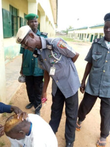 Kano Hisbah Officials Shave Secondary School Students' Hair [PHOTOS] | Daily Report Nigeria