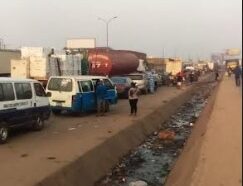 Protest: Truck Drivers Block Onitsha Bridge Over Heavy Taxation | Daily Report Nigeria