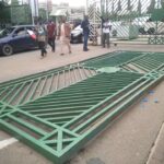 BREAKING: NLC Protesters Pull Down National Assembly Gate