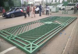 BREAKING: NLC Protesters Pull Down National Assembly Gate