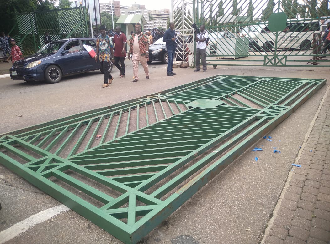 BREAKING: NLC Protesters Pull Down National Assembly Gate