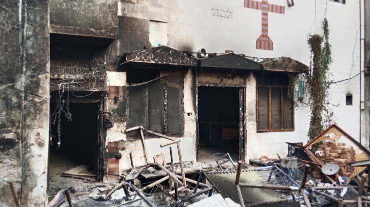 They broke the windows, doors and took out fridges, sofas, chairs and other household items to pile them up in front of the Church to be burnt.