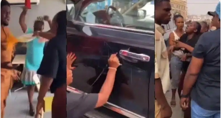 Drama as lady spots her man with another woman, damages his car | Daily Report Nigeria