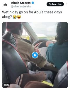 Reactions As FRSC Official Is Seen Dragging Steering Wheel With Woman In Moving Car [VIDEO] | Daily Report Nigeria