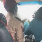 Reactions As FRSC Official Is Seen Dragging Steering Wheel With Woman In Moving Car [VIDEO] | Daily Report Nigeria