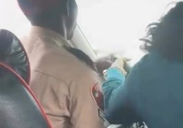 Reactions As FRSC Official Is Seen Dragging Steering Wheel With Woman In Moving Car [VIDEO] | Daily Report Nigeria