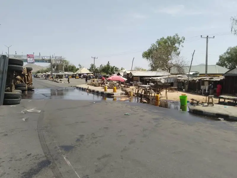 Residents Scoop Fuel, As Petrol Tanker Falls In Taraba Daily Report Nigeria Residents Scoop Fuel, As Petrol Tanker Falls In Taraba