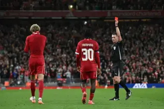 Ekitike being shown a red card
