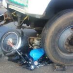 trailer crushes motorcycle