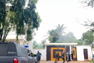 Policemen at Soludos residence